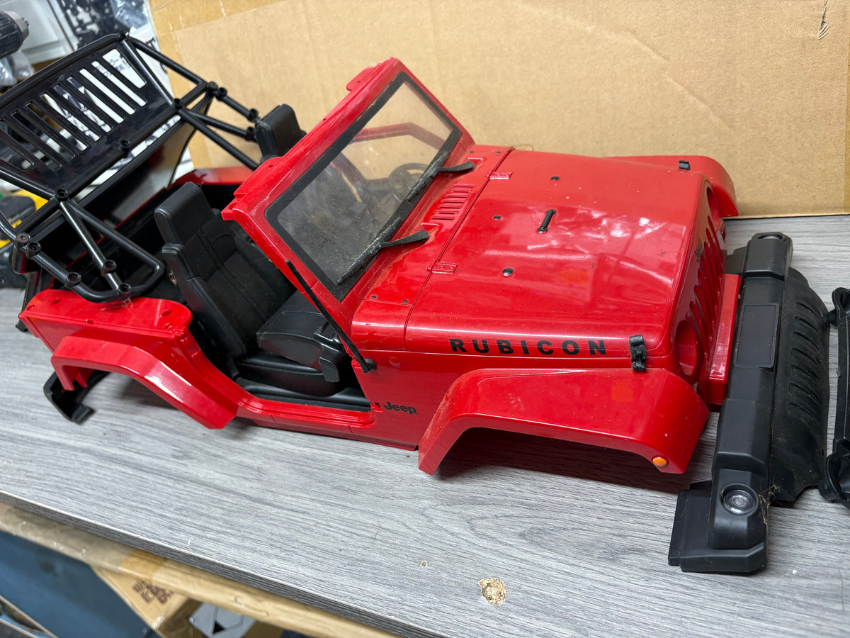 Used - 1/10 RC Rock Crawler hardbody Jeep Rubincon Body With parts - not complete