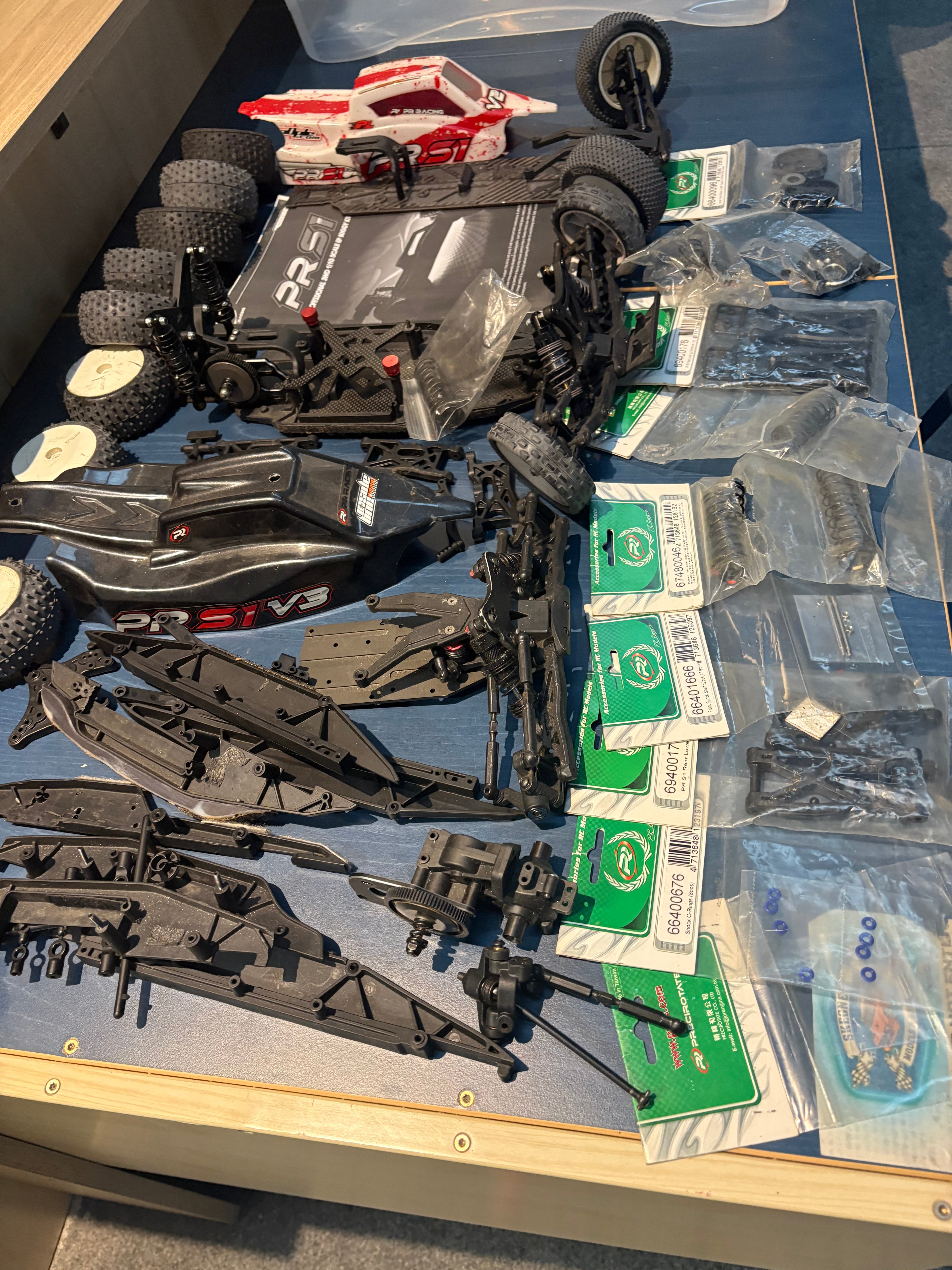 Used - 3x PR Racing S1 1/10 Buggies + spare parts (for spares or repairs)