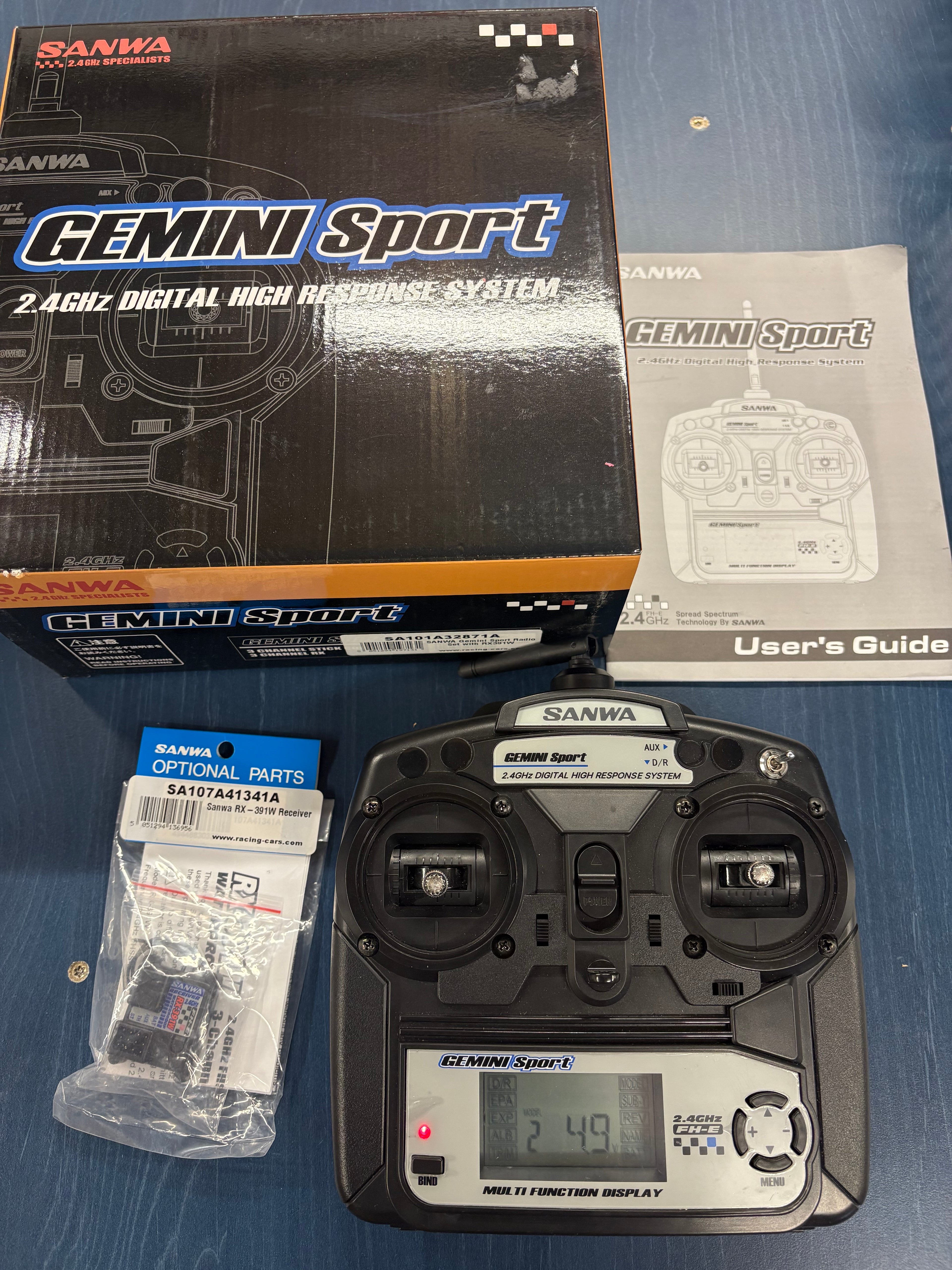 Used - SANWA - Gemini Sport 2.4ghz RC Car/Buggy Stick Radio Set w/RX391W NEW Receiver - SA101A32871A - Good as new! Our own personal radio