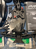 Used - 3x PR Racing S1 1/10 Buggies + spare parts (for spares or repairs)