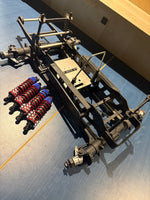 Used - Vintage 1/8 Kyosho Mad Force VE EP Twin 2S Lipo version - chassis kit rolling with shocks (incomplete - spares or repairs)
