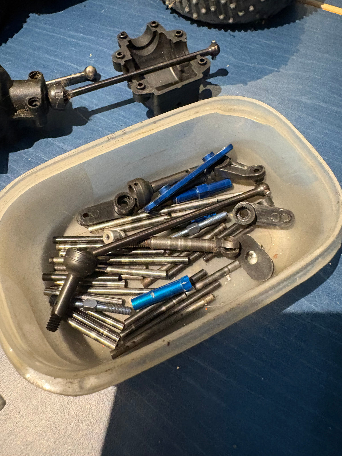 Used - job lot of spares, wheels, drive shaft, sus pins, diff, nitro engine flywheel etc