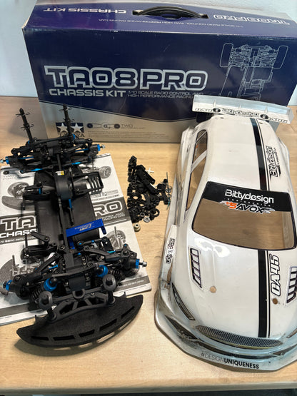 Tamiya TA08 Pro with Optional Parts - Good working order - Used, with box, manual and spares.