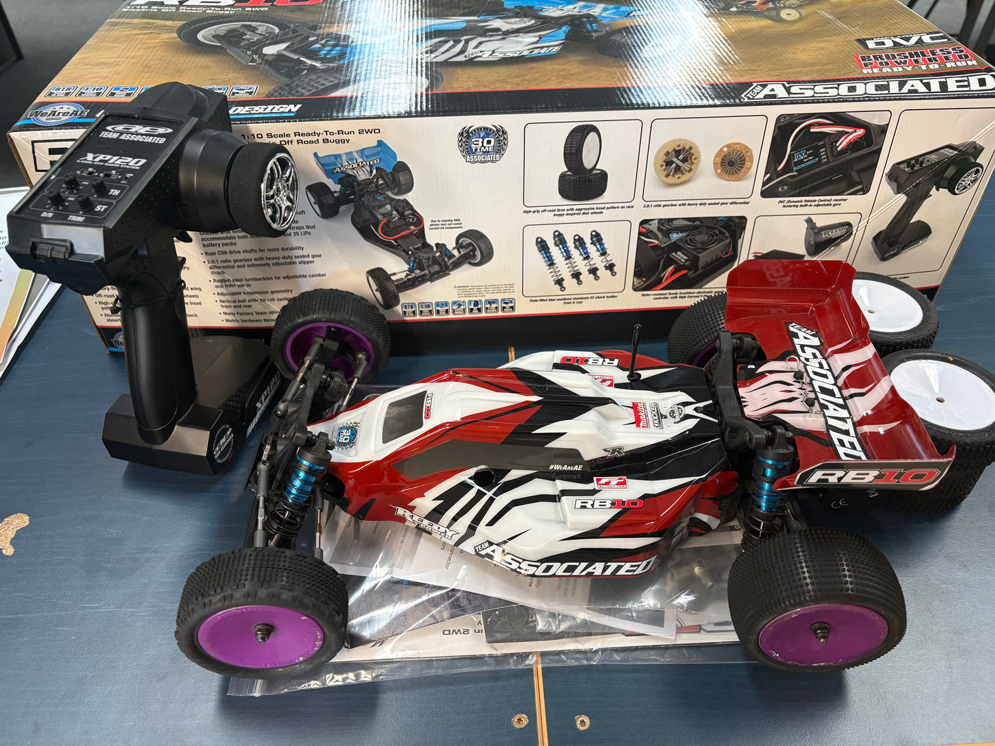 (Ex-DEMO) TEAM ASSOCIATED - RB10 Almost (Brushless) RTR RED 1/10 BUGGY (No battery or Charger) AS90032 (Extra New Carpet Tyres, inserts and Purple Wheels Fitted)